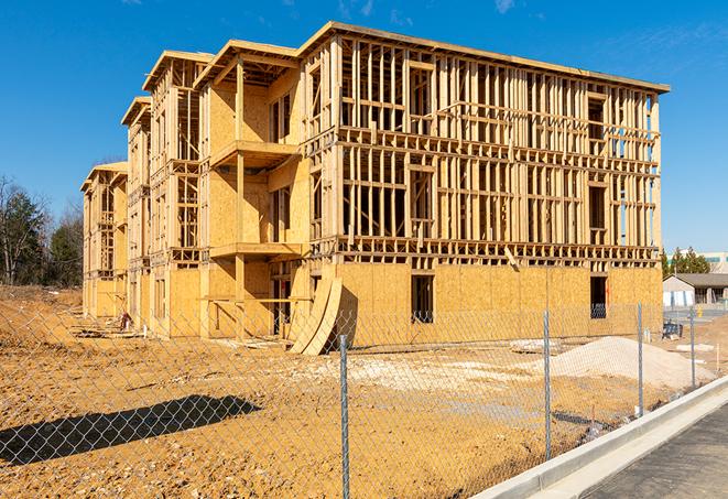 a snapshot of temporary chain link fences protecting a large construction project from unauthorized access in Alturas